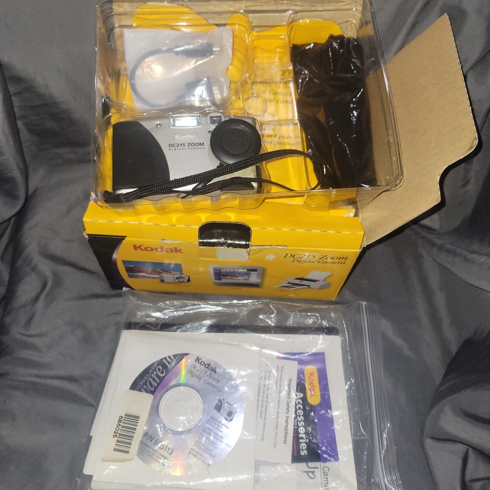 KODAK DC215 ZOOM VINTAGE DIGITAL CAMERA W/BOX CABLES MANUALS USED WORKS